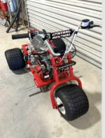 custom-built red and black mini trike